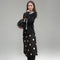 Black-and-white polka-dot Pleione midi skirt worn with a dark blazer