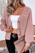 Front of Dusty Pink V-neck cardigan showing the button placket