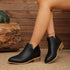V-Cut Faux Suede Ankle Boots: Black ankle boots worn, side view
