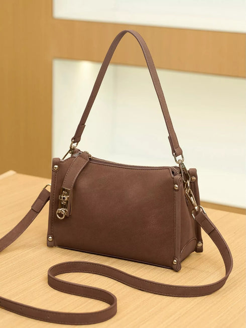 Brown Buckle-Detail Crossbody Bag: Brown bag, angled product view