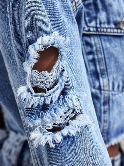 Blue distressed cropped denim jacket with raw hem for women