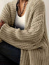 Khaki longline cardigan showing ribbed cuffs and open front