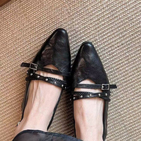 Close-up of the slingback flats two studded buckle straps across the foot