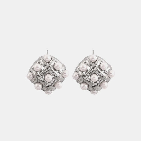 Shell Pearl Stud Earrings: Silver-tone stud earring pair on white background