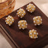 Shell Pearl Stud Earrings: White-bead stud earrings, alternate brown-fabric display