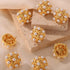 Shell Pearl Stud Earrings: White-bead stud earrings on stone blocks