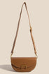 Camel crescent purse hanging from its adjustable shoulder strap