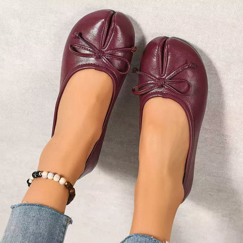 Burgundy bow flats shown from above