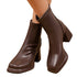 Front angled view of Brown ankle boots with raised soles