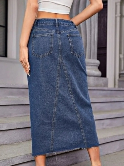 Back view of medium-blue midi-length denim skirt