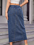 Back view of medium-blue midi-length denim skirt