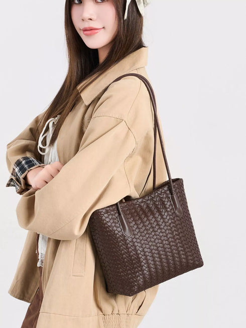 Coffee Brown Woven-Texture Shoulder Bag: Brown woven-texture bag worn on shoulder, side view