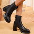 Black square-toe ankle boots shown from two side angles