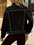 Back view of black denim jacket with silver-tone studs along the yoke and hem