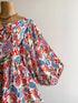 Plus Size Floral Romper with Tied & Ruched Details - Twice The Charm Boutique