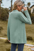 Back view of light green textured long cardigan