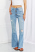 Full-length light-blue Jess flare jeans with frayed hems