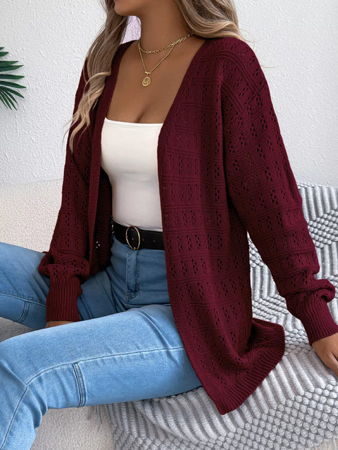 Burgundy crochet-knit cardigan, front view worn with a white top
