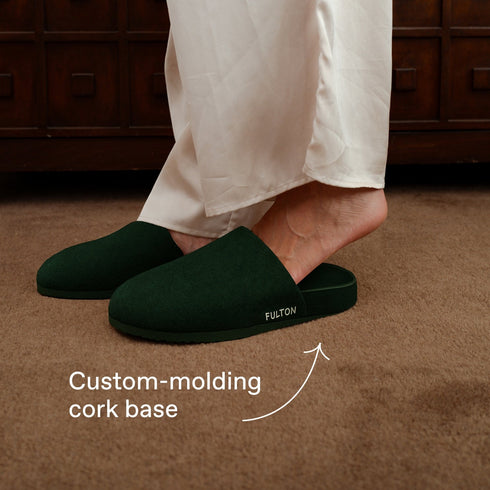 Forest Green Fulton House Shoes worn with cream pants, side view of cork base