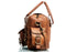 Side view of Walker Tanned leather bag showing the buckle pocket and strap attachment