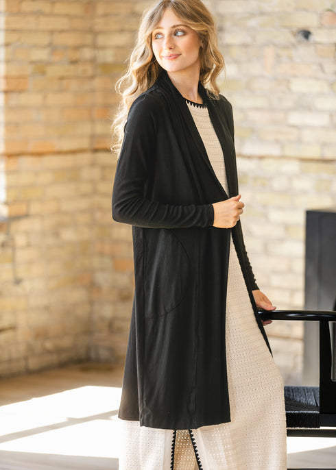 Closer front view of the black cardigan and long sleeves