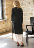 Back view of black longline cardigan