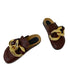 Pair of brown STEVVEX mules on white showing rounded closed toes