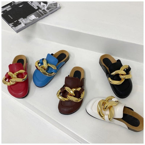Five colors of STEVVEX closed-toe chain mules arranged on a white table