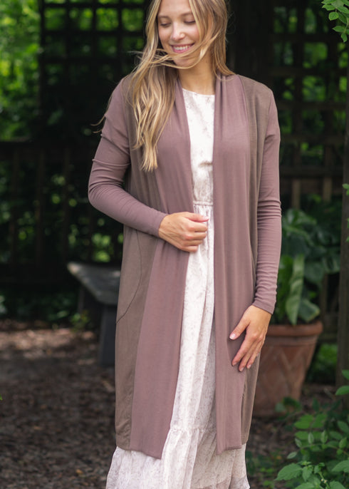 Front view of muted mauve-toned cardigan showing its open neckline