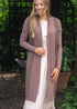 Front view of muted mauve-toned cardigan showing its open neckline