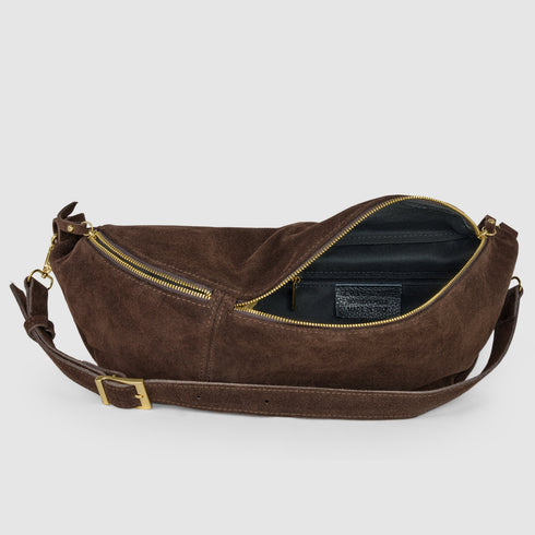 Open chocolate suede bag showing dark lining and inner zip pocket
