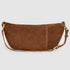 Back view of brown suede crescent bag and adjustable strap