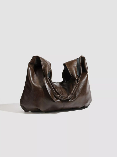 Brown Glossy Hobo Shoulder Bag with Matching Pouch: Brown hobo bag with handles folded down