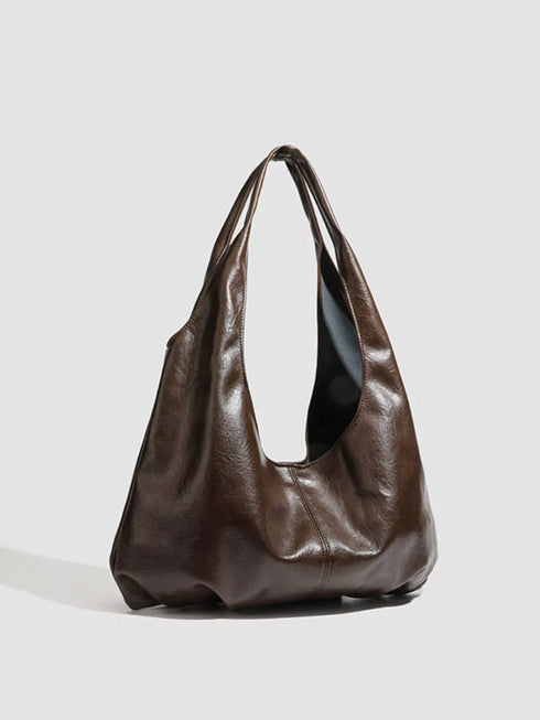 Brown Glossy Hobo Shoulder Bag with Matching Pouch: Glossy brown hobo bag, angled product view