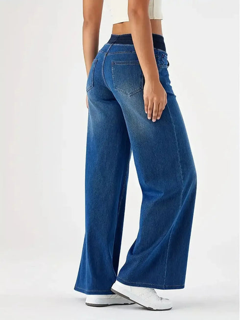 Side and back view of blue jeans with rear patch pockets