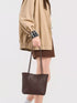 Coffee Brown Woven-Texture Shoulder Bag: Brown bag held by long handles
