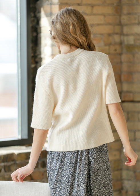 Back view of the ivory Zadie short-sleeve cardigan