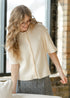 Zadie ivory cardigan front view showing the button placket and roomy short sleeves